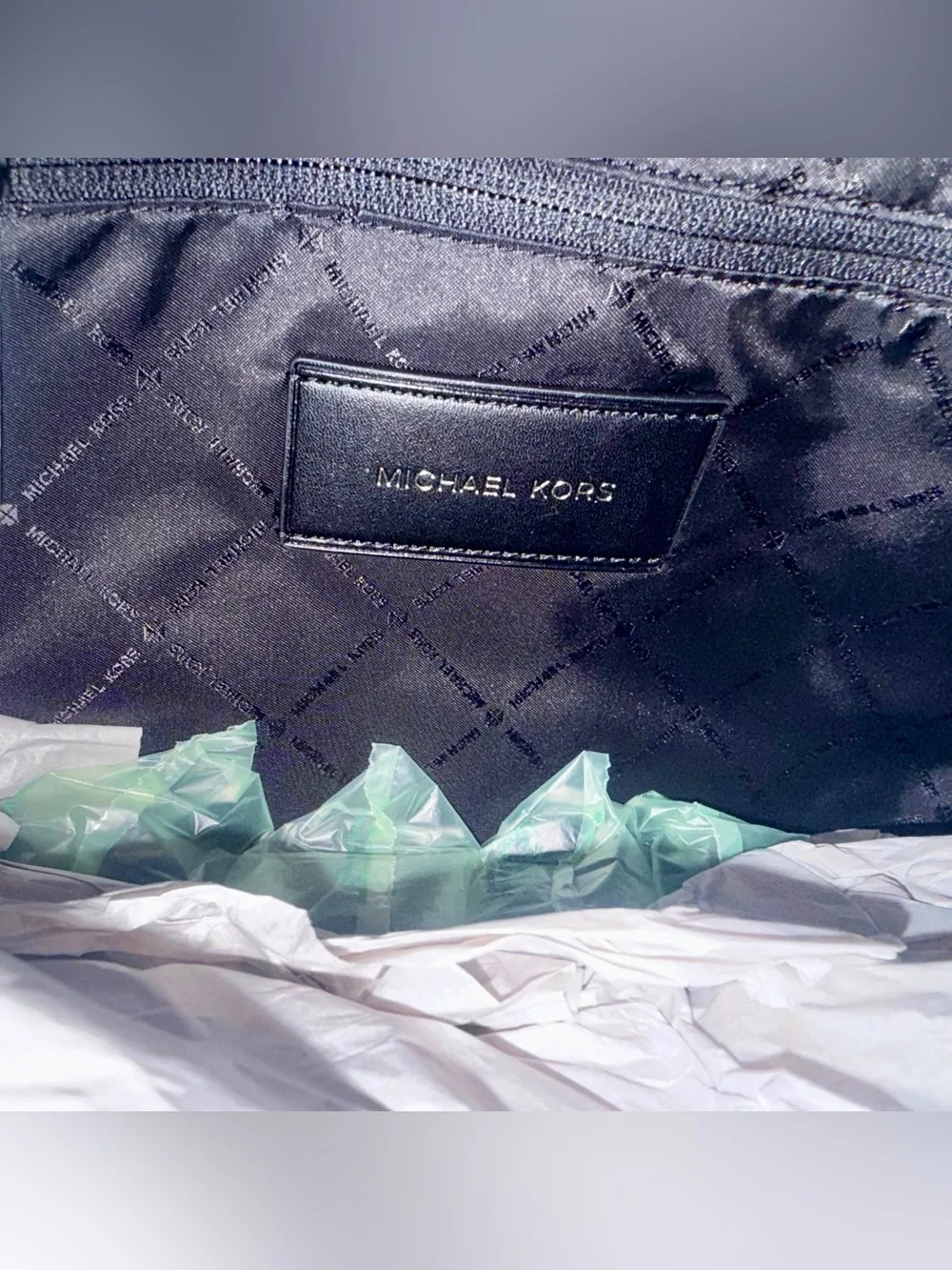 Michael Kors Black Pebbled Leather Flap Backpack